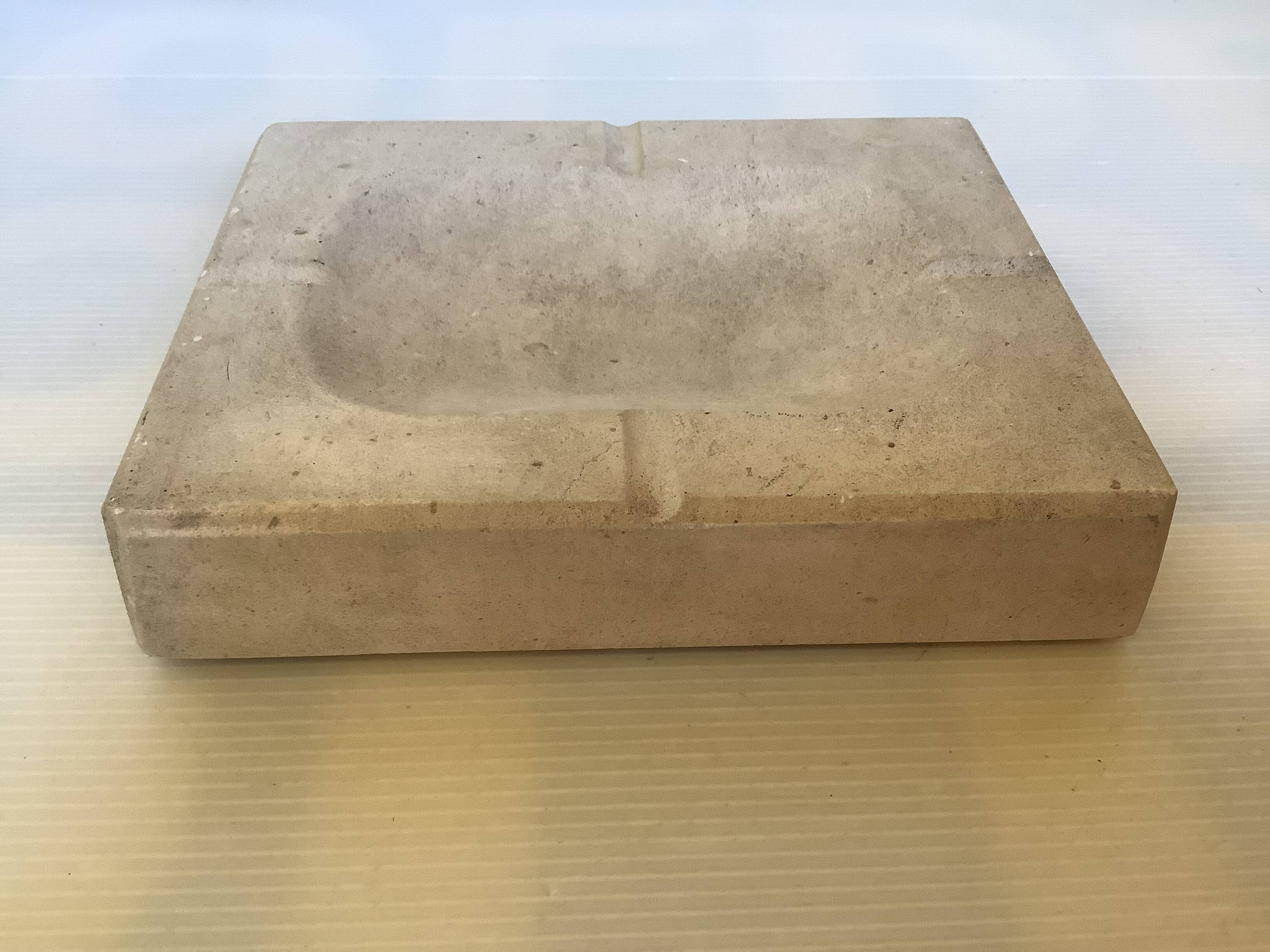 Stone ashtray pocket emptier