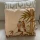 Vintage cushion decorated with birds, Thailand