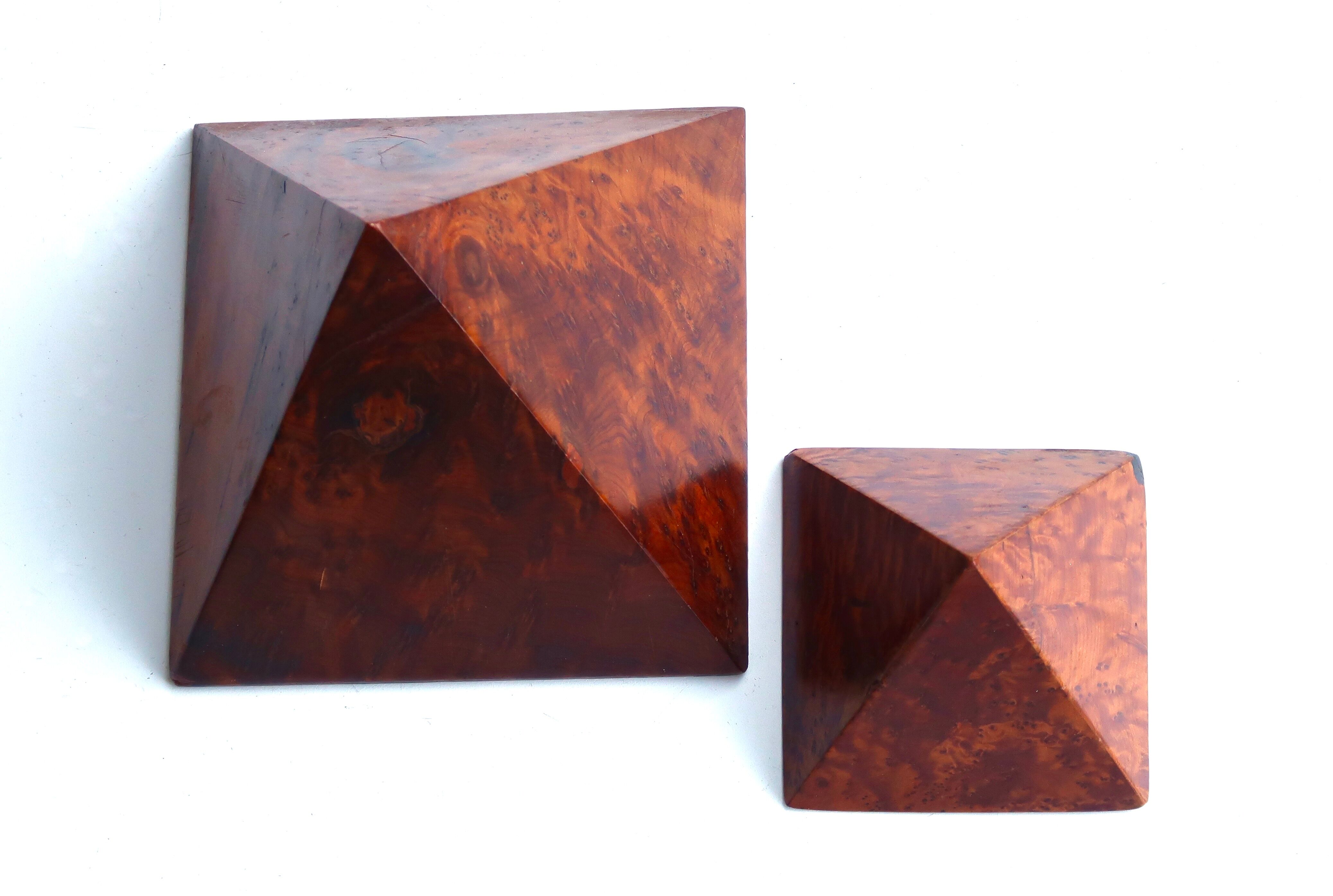 Two wooden pyramids with elm magnifying glass, 70s