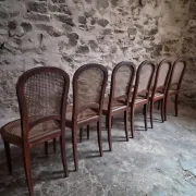 Set of 6 antique Louis XVI style dining chairs with caning.