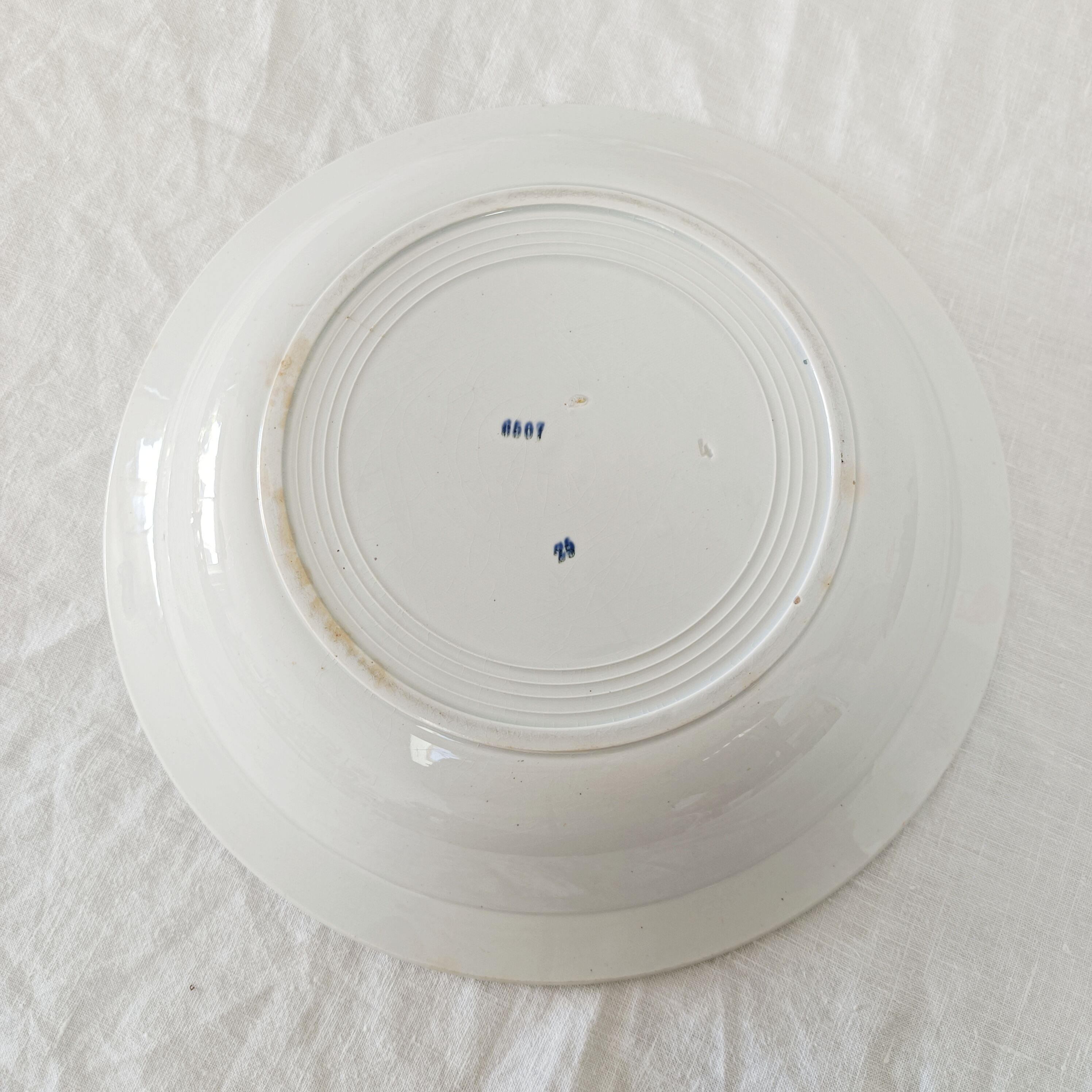 Large hollow dish iron earth Company Amandinoise