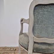 Louis XV style cabriolet armchair in patinated wood and velvet