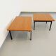 Suite of two vintage modernist Isa coffee tables in teak and black metal from the 60s