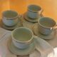 Set de 4 tasses blanches et or en porcelaine