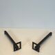 Pair of modernist andirons in steel and wrought iron