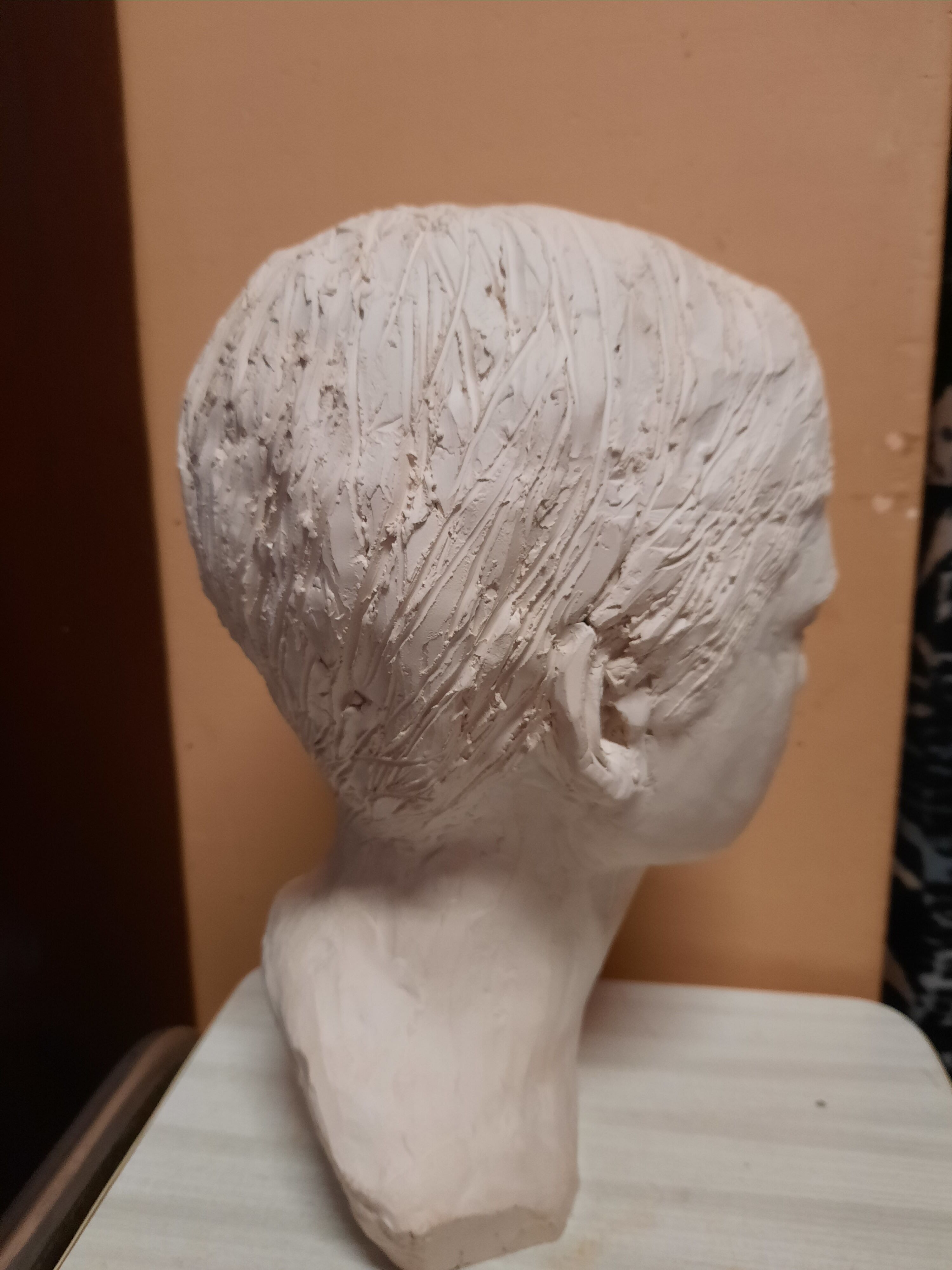 Boy's head in plaster