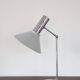 Chrome metal desk lamp and gray articulated arm