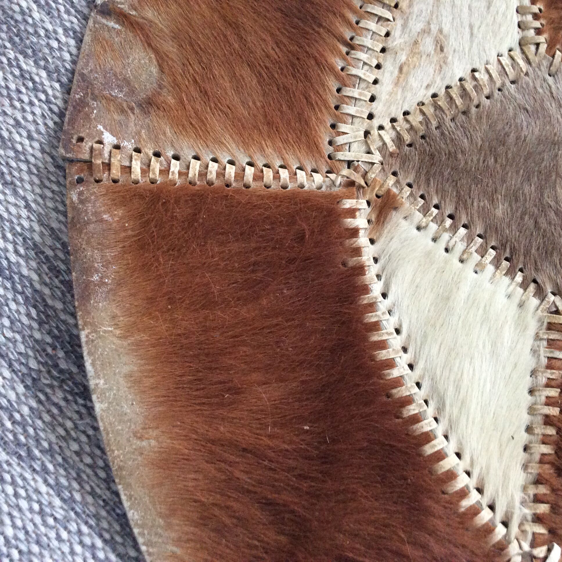 Vintage round cowhide carpet from the 60s and 70s