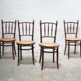 Chaise bistrot cannée ancienne en bois par les éditions Fischel