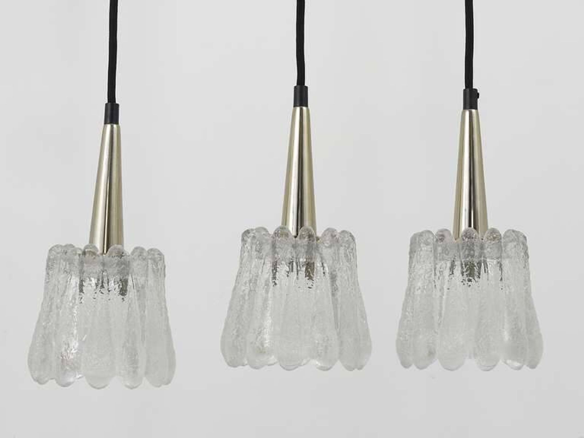 Set of three glass pendants by Carl Fagerlund for Orrefors, Sweden, 1960s.