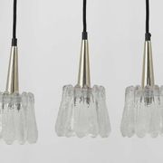 Set of three glass pendants by Carl Fagerlund for Orrefors, Sweden, 1960s.