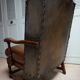 English high back cognac leather wingchair by Criterion cord