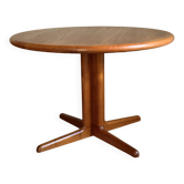 Vintage round Scandinavian teak table with a central star base, extendable.