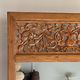 Very large freestanding teak mirror with an openwork carved pediment, Indonesia.