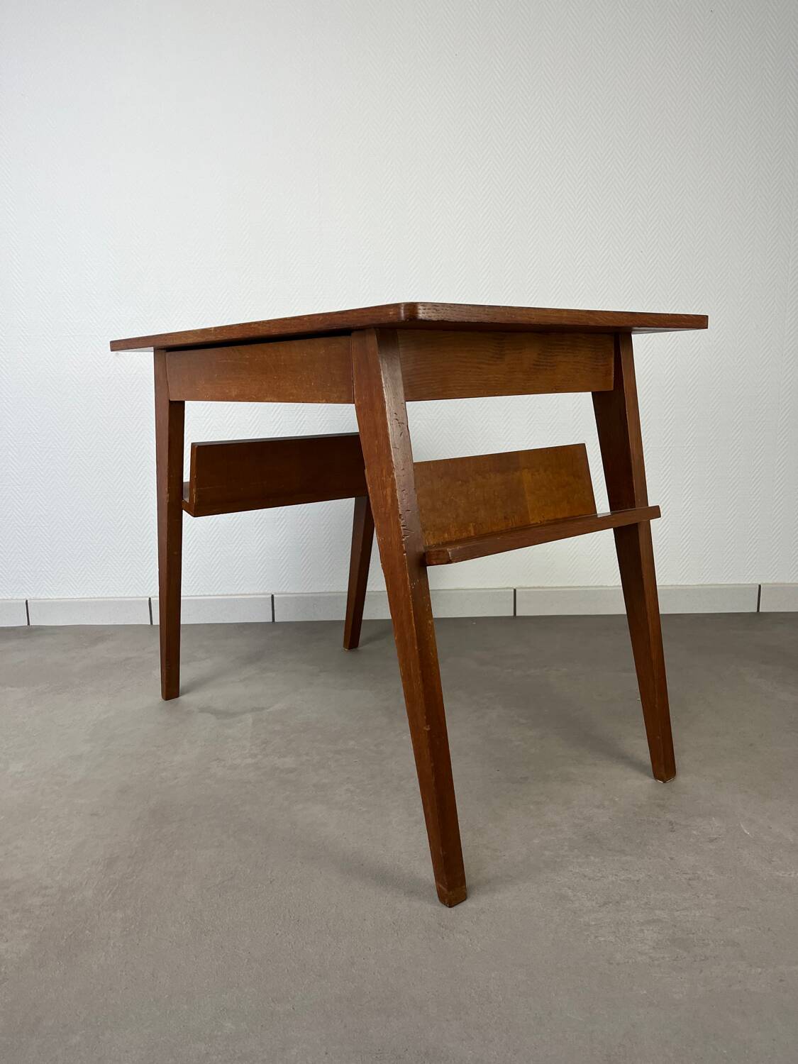 Compass leg desk, 1950s wood reconstitution style.