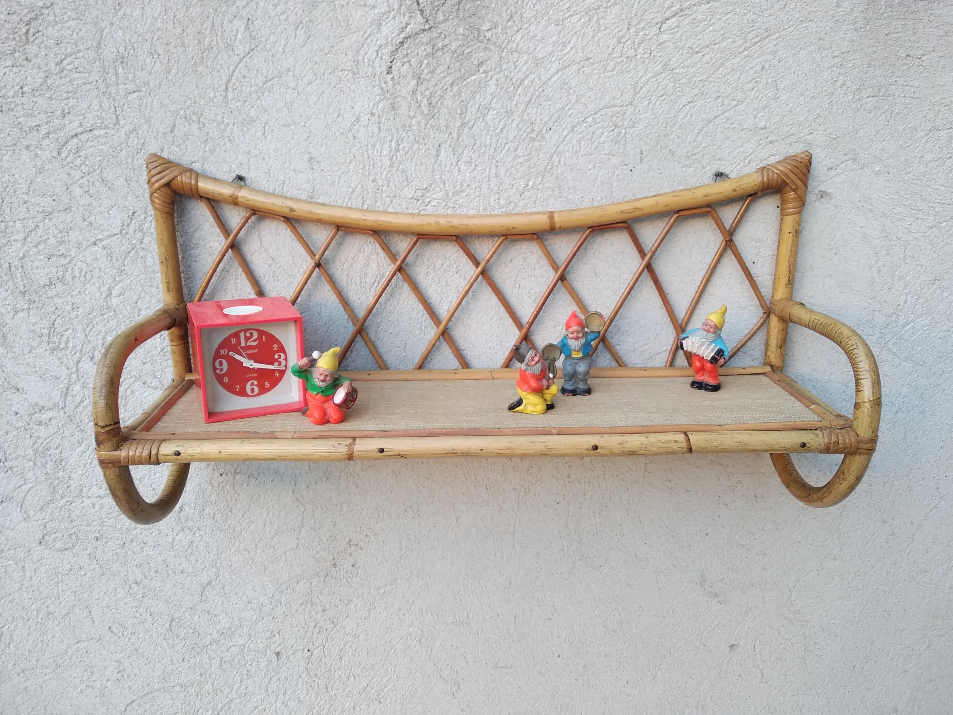 Rattan wall shelf from the 60s