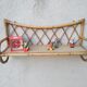 Rattan wall shelf from the 60s