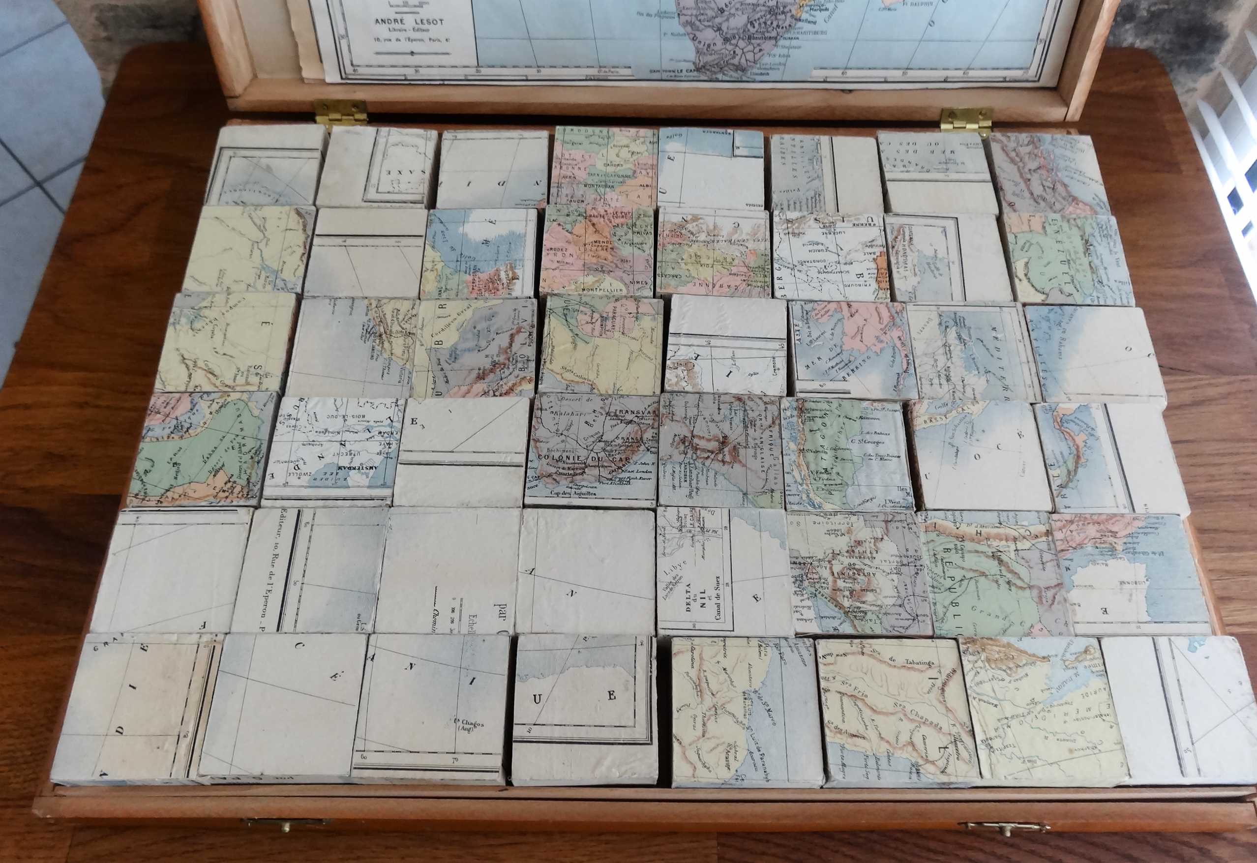 Old saussine geographical atlas in the form of a set of cubes around 1900