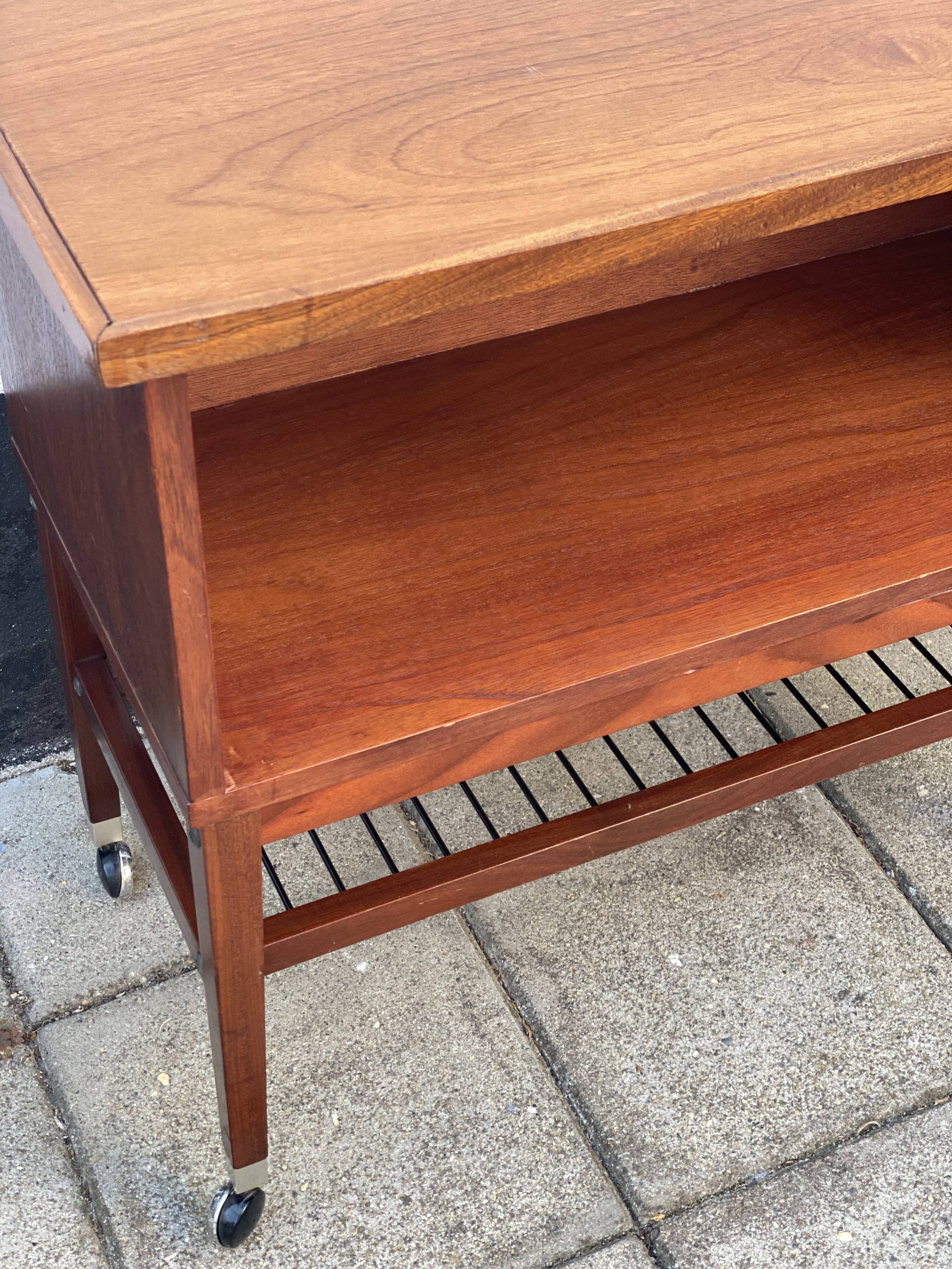 Vintage teak side table with metal magazine rack