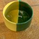 Large bowl in vintage green and yellow enamelled ceramic