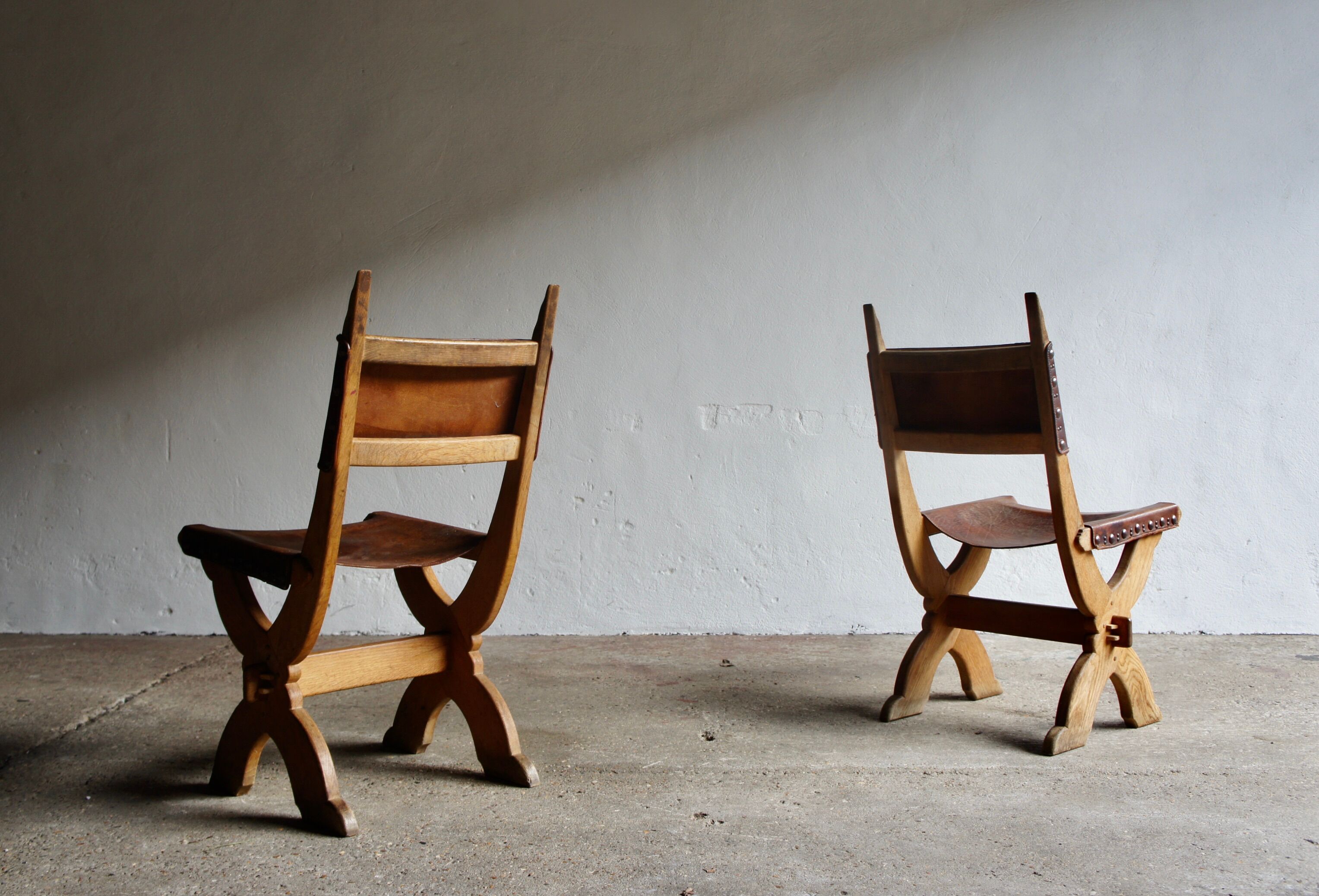 Pair of gothic style leather chairs