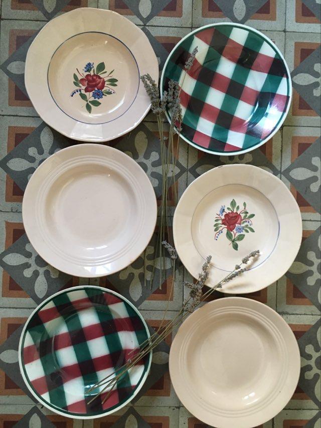 Matching old hollow plates in pink and green.