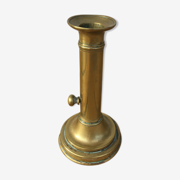 Brass pusher candle holder