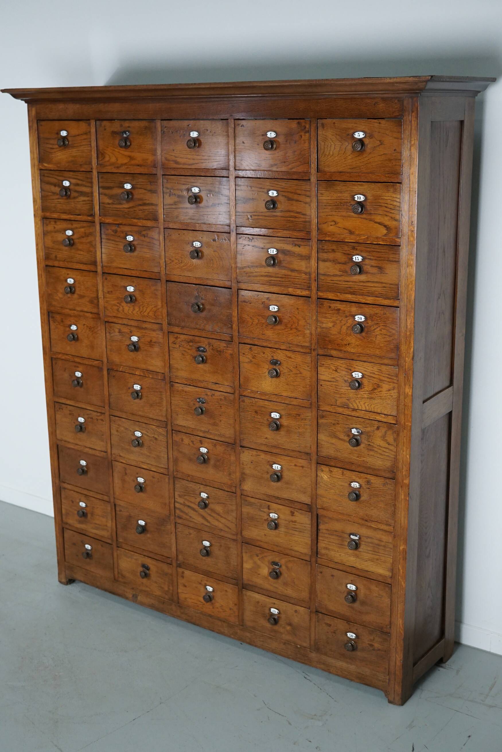 Large dutch oak apothecary cabinet / barber cabinet with enamel shields, 1900s