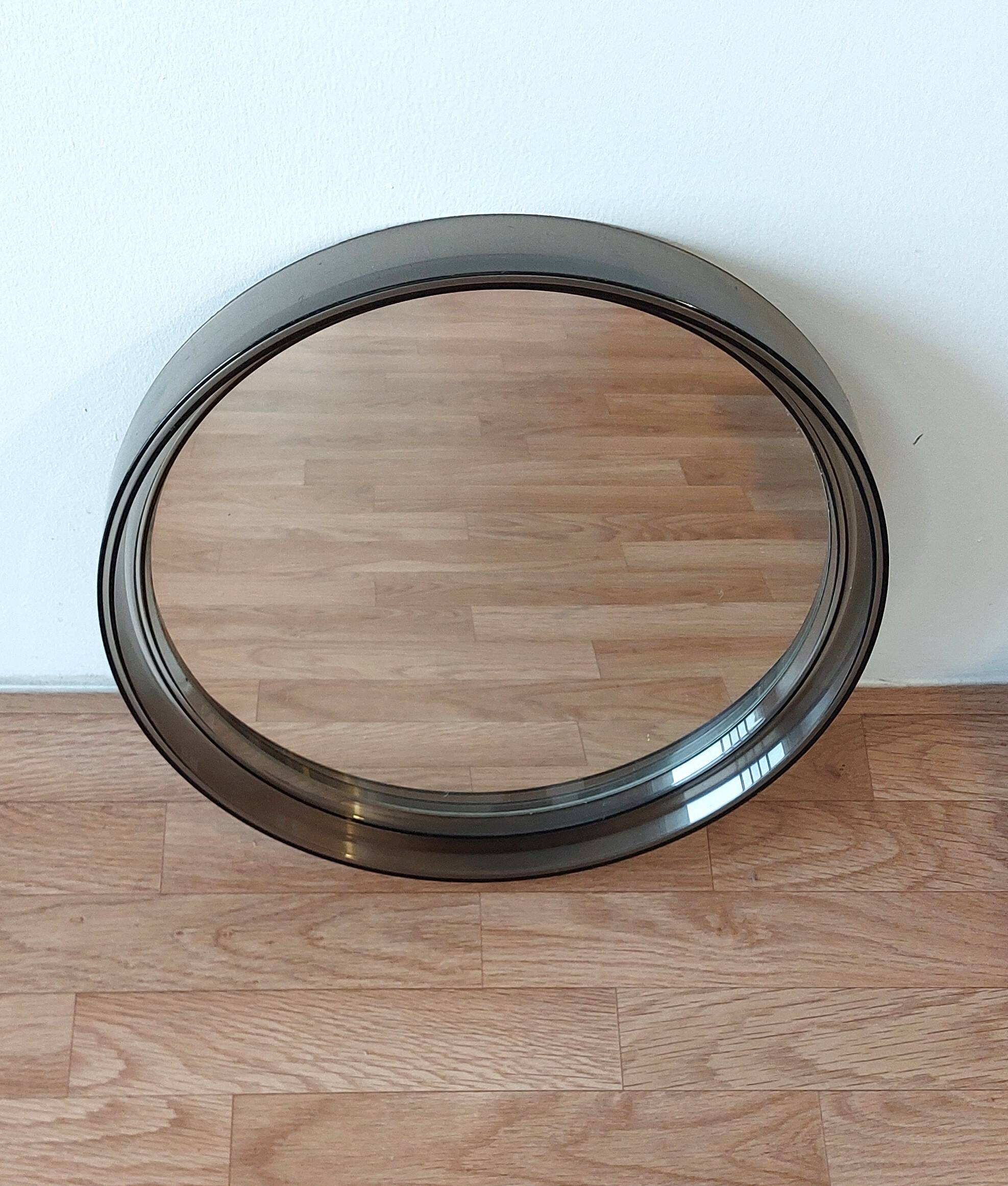 Round smoked plastic mirror 1970 Vintage.