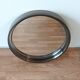 Round smoked plastic mirror 1970 Vintage.