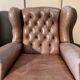 Pair of Chesterfield leather wingback armchairs