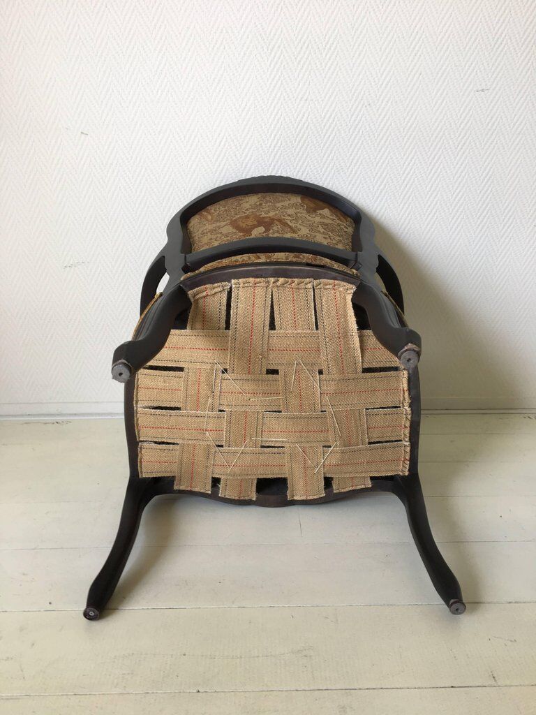 Black baroque armchair with fabric designed by wildlife by Ascension Latorre, Spain