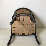 Black baroque armchair with fabric designed by wildlife by Ascension Latorre, Spain