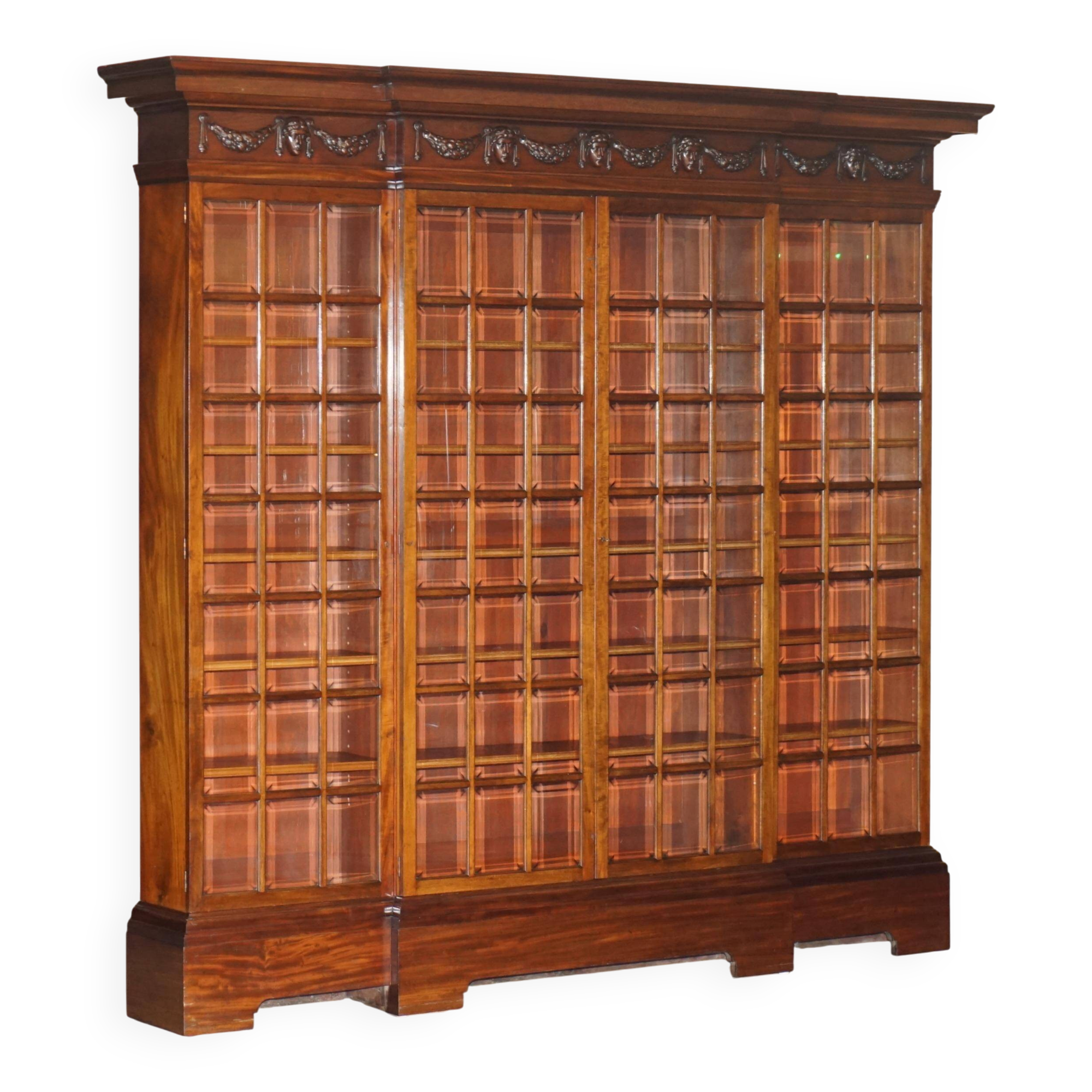 Monumental glass library in Victorian hardwood.