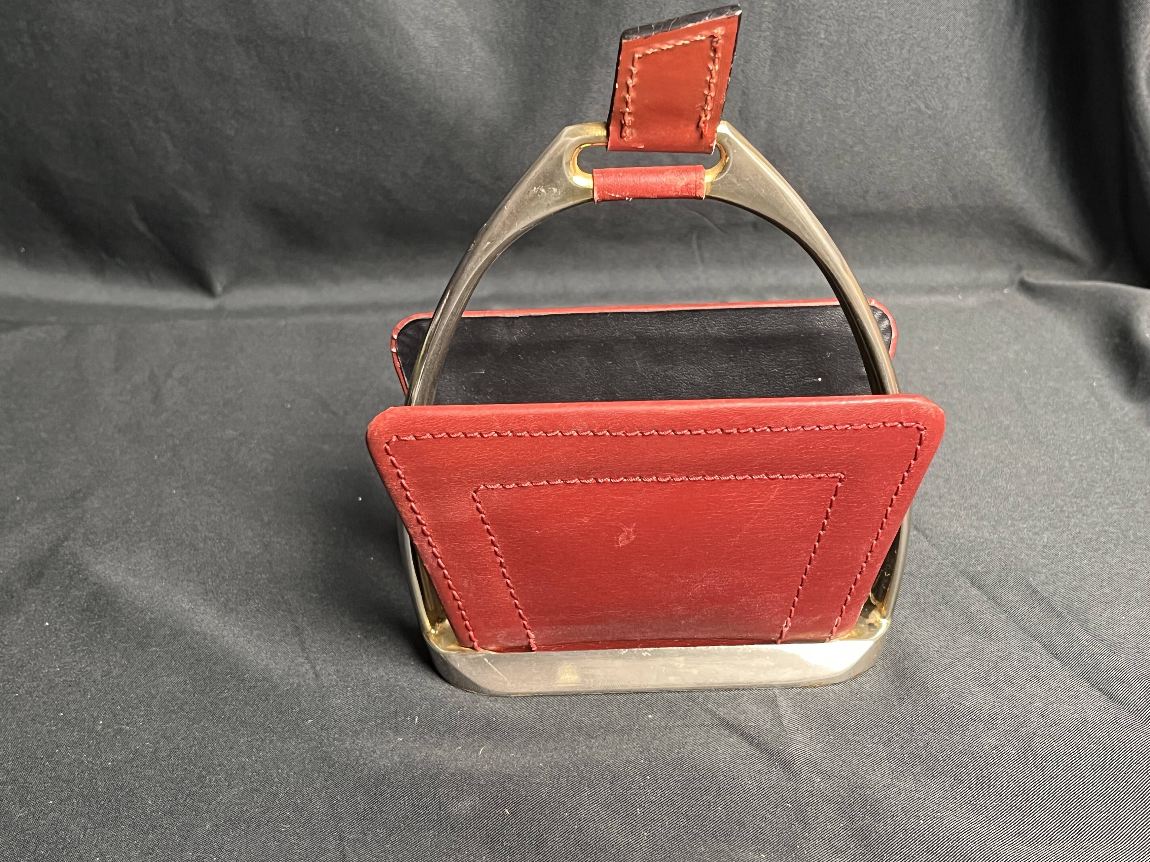 Longchamp, empty pocket document holder with leather and gold metal stirrup from around 1970.