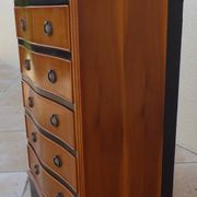 Louis XVI style chest of drawers in wood and cherry veneer.