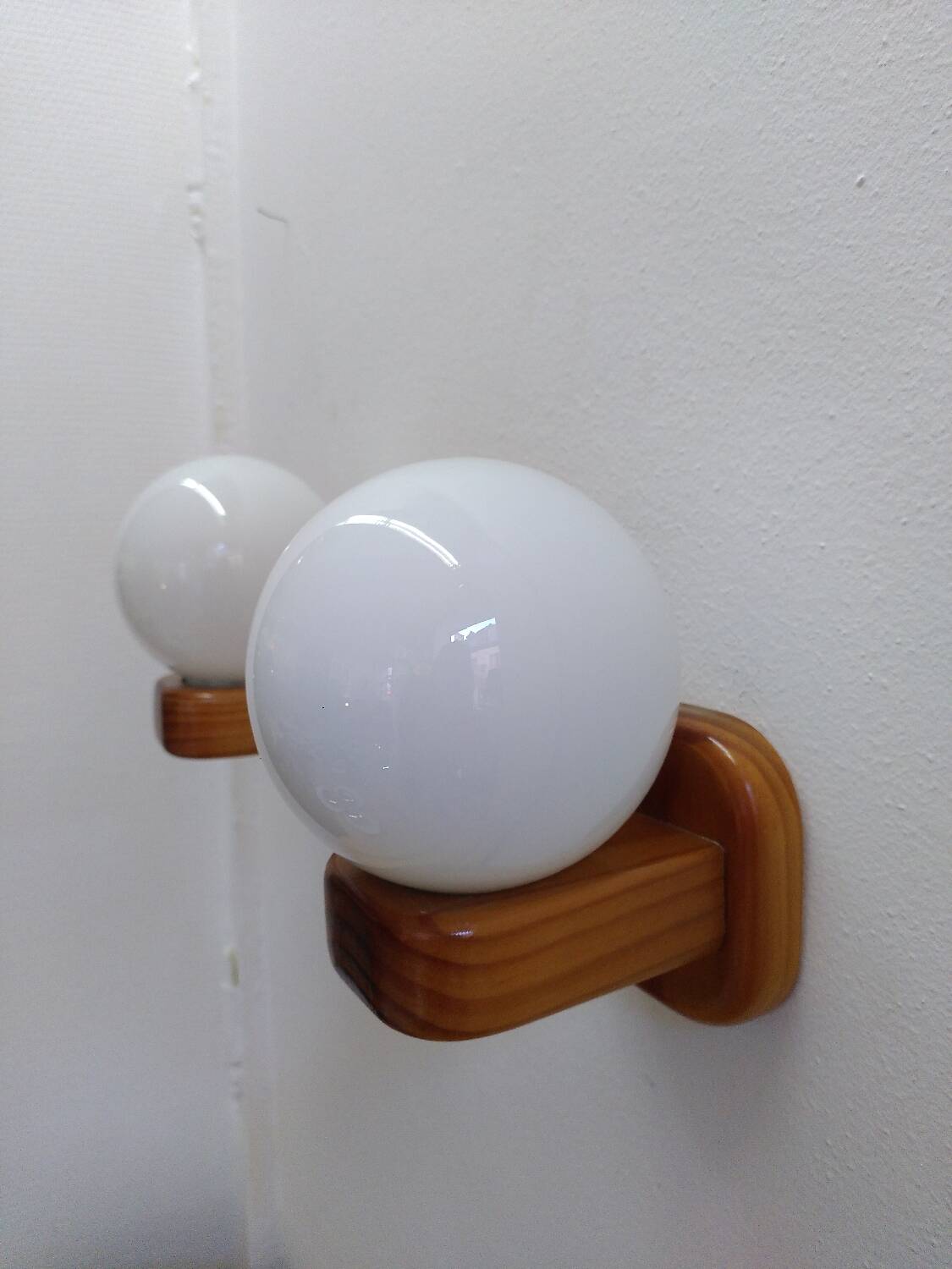 Pair of Scandinavian pine and opaline wall lights, 1980