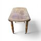 Antique drop-leaf table in wood, with turned legs and castors.