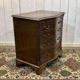 1950s English mahogany chest of drawers with one shelf