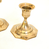 Duo of brass candle holders