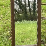 Rustic mirror called brutalist, molded carved natural wood