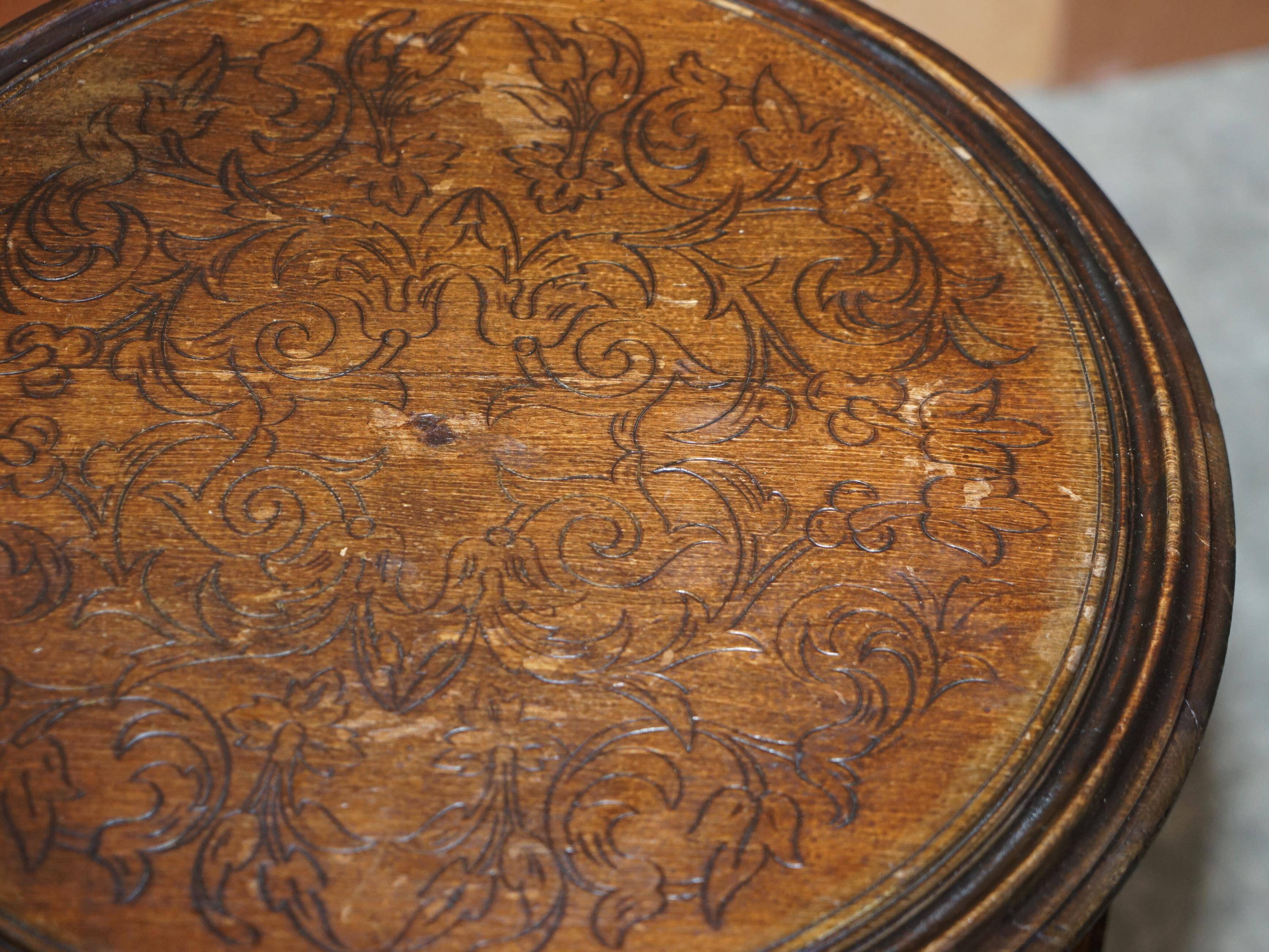Victorian oak library table, two levels, pokerwork top.