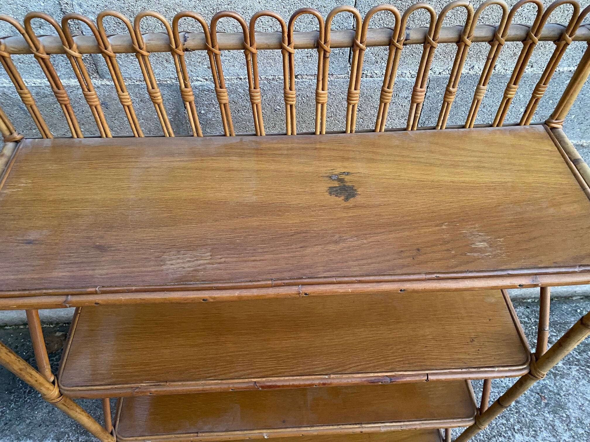 vintage rattan shelf on stand