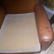 Brown leather club armchair