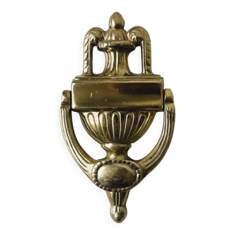 Brass door knocker.