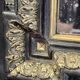 Napoleon III mirror in blackened wood and gilded decoration, second half of the 19th century.