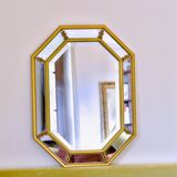 Large beveled, neoclassical mirror with gilded wood edges