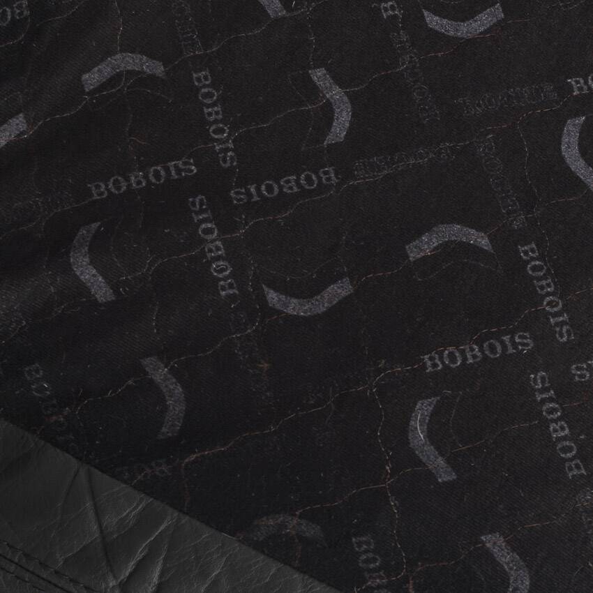 Black leather two-seater sofa. Roche Bobois edition. France, 1980s.