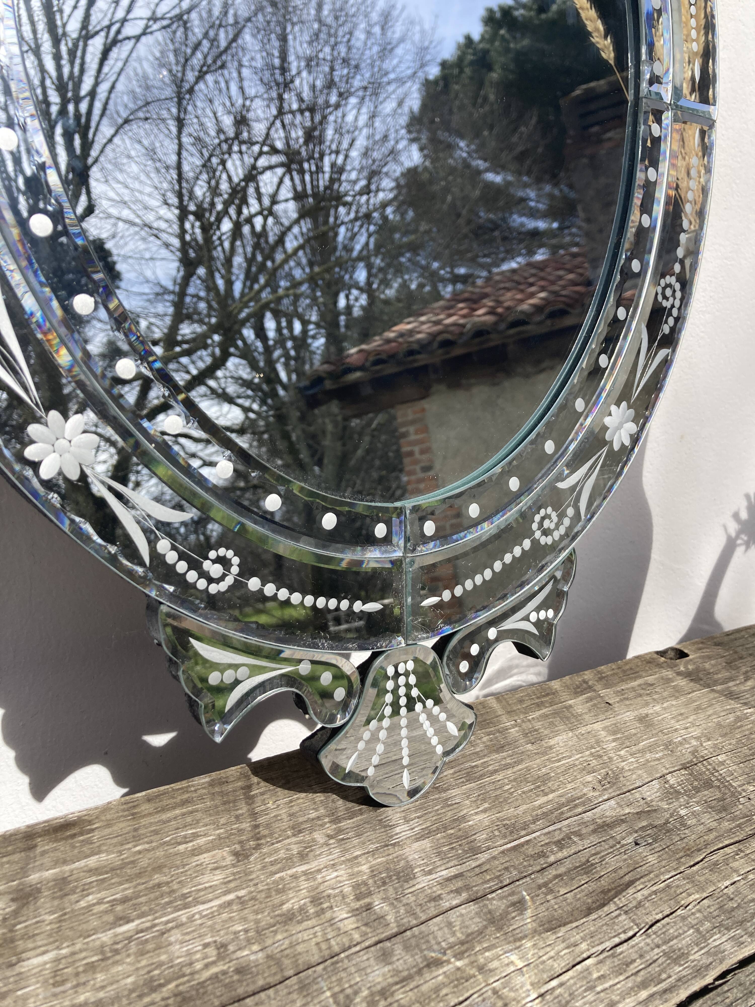 Oval Venetian wall mirror