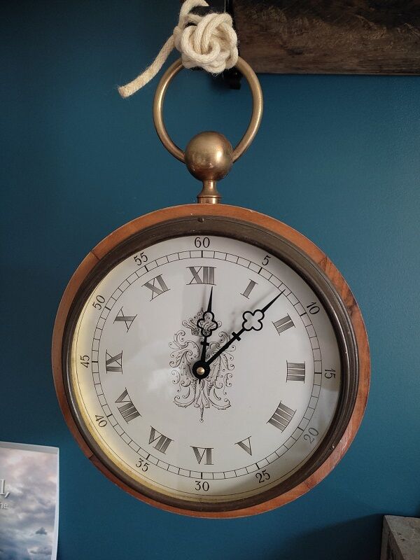 Patinated inlaid wooden clock shape watch pocket